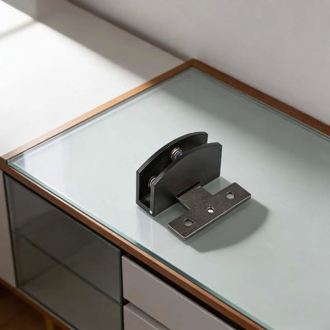 Heavy Duty Frameless Glass Door Hinge And Zinc Alloy Cabinet Clamps For 8 Millimeter Panels Smooth Glide displayed on glass surface.