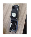 Electric proportional valve, black housing with white knob, labeled 0831006003 2.7A, side port connections