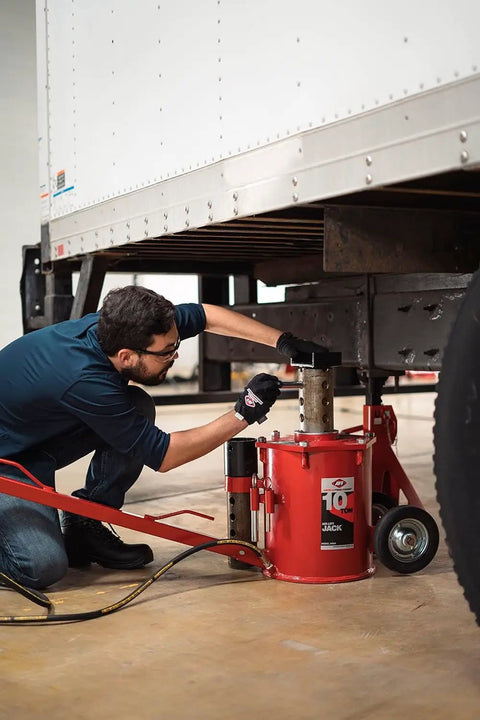 Tough As Nails 10 Ton Air Lift Jack With Precise Valve Control Heavy Duty Air Powered Lifter For Trucks Trailers And Construction Gear Built To Run Smooth As Butter On Any Auto Shop Floor Without Breaking A Sweat
