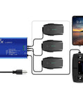Parallel 158W Fast Charging Hub connected to 3 DJI Mavic Pro batteries and remote control with smartphone display in setup.