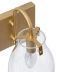 Close-up of a 3 Light Modern Vanity Light Fixture in Brass Finish With Clear Glass Shades For Bathroom, showing bulb detail