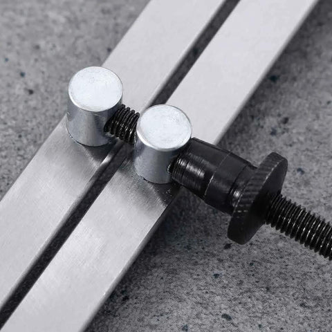 Big Horn 19053C 8-inch spring caliper/divider set; close-up of silver jaws and black adjustment screw