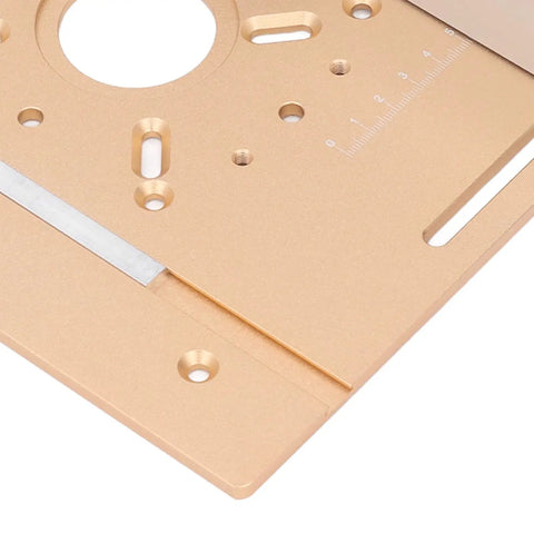 Close-up of Premium Router Lift System Aluminum Alloy Upgrade plate showing detailed holes and markings for precision woodworking.