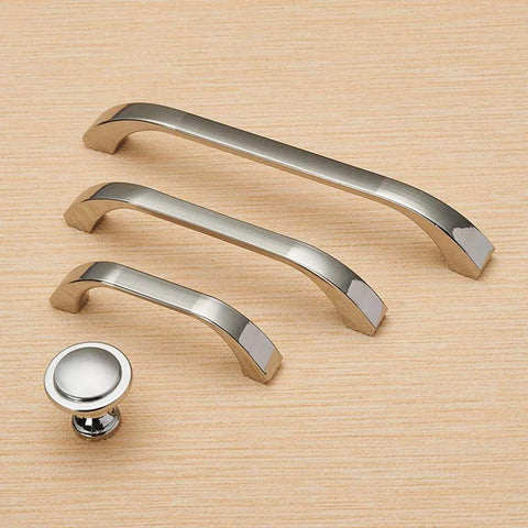 Brushed Nickel Cabinet Handles Three Pack With 64 Millimeter Hole Centers Euro Style Drawer Pulls in various sizes displayed on wood surface
