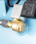 Installed view: brass three-port check valve with male threads (G1/8, G3/8, G1/2) mounted on a blue air compressor housing.