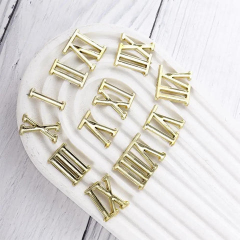 Quartz Clock Numerals Replacement Set Not Self Adhesive For Clock Repair And DIY Wall Clocks Arabic Numbers And Black Roman Numerals Available In Silver Gold Or Black Finish shown in gold Roman numerals arrangement