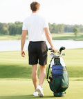 Man on golf course with Portable Golf Ball Storage Bag With Multiple Zip Pockets And 3 Compartments For Easy Organization Of Balls Tees Gloves And Accessories Lightweight Blue Golf Organizer For Men And Women on cart