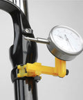 Dial indicator on Pro Grade Wheel Turning Stand for precise bike wheel alignment, scratch-resistant nylon and metal, black