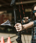 Archer using 125 Grain Fixed Hunting Broadheads With Stainless Steel Blades And Right Bevel For Compound Bow Crossbow