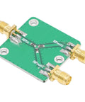 Real Deal Two Way RF Power Splitter Module And Signal Dividing PCB Board Offering Six Decibel Attenuation With Straight Up Reliable DC To Five Gigahertz Operation Period, showing PCB with SMA connectors.