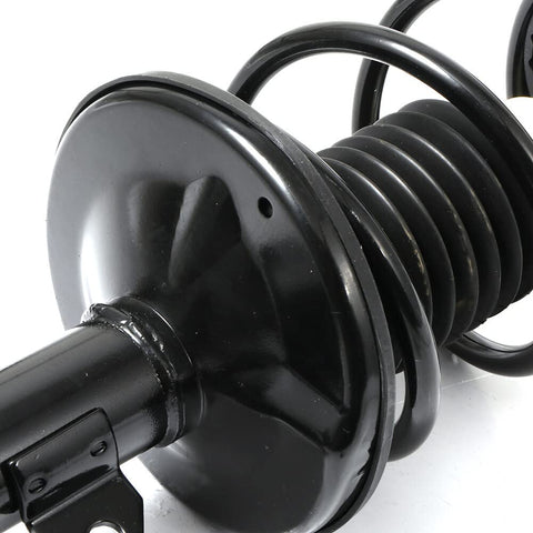 Close-up of front pair complete struts coil spring assembly shock absorber for Toyota Corolla 2009-2013 and Matrix 2011-2013 replacement.