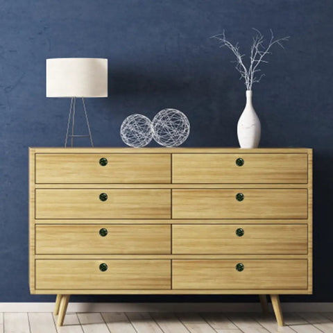 Four Pack Dope Dark Green Marble Texture Drawer Knobs Premium Crystal Glass Cabinet Handles on dresser with blue wall backdrop