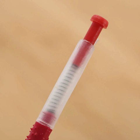 Close-up of red retractable needle from Beekeeping Grafting Tools Kit 10 Pack Retractable Needles For Beehive Queen Larva Rearing Essential Gear