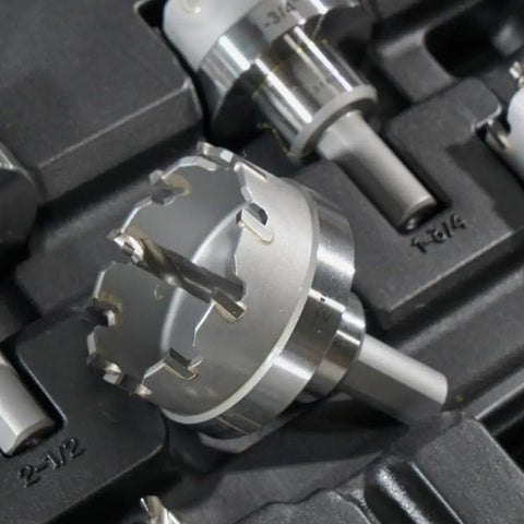 Close-up of Heavy Duty Hole Cutter Kit With Carbide Cutters And Two Pilot Bits In Rust Proof Molded Plastic Case Eight Piece Workhorse Set