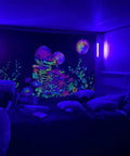 Room with tapestry glowing under 1ft 10W UV Blacklight Bar Two Pack For Fluorescent Art Tapestries Posters And Body Paint Glow Up Party Lights