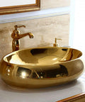 Heavy Duty Ceramic Vessel Sink For Modern Bathrooms With Included Faucet Dope Gold Oval Basin on bathroom counter.