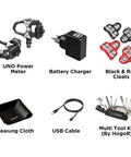 Image showing Assioma UNO Upgraded Single Sided Power Meter Pedals With Waterproof Build Bluetooth And ANT Plus Connectivity True Left Power Data Includes Black Cleats Red Cleats And Cleaning Cloth, battery charger, USB cable, and multi-tool kit.