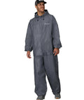 Man wearing Ultra Lite2 Waterproof Breathable Rain Suit With Jacket And Pants, lightweight protective rain gear for outdoor activities