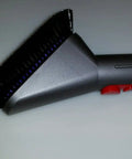 Mattress attachment from the V8 Cordless Vacuum Tool Kit With Mattress Attachment, Soft Dust Brush, Extension Hose, And Stubborn Dirt Brush.