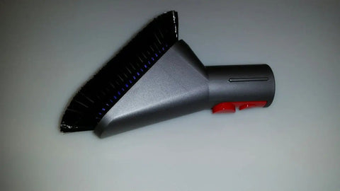Mattress attachment from the V8 Cordless Vacuum Tool Kit With Mattress Attachment, Soft Dust Brush, Extension Hose, And Stubborn Dirt Brush.
