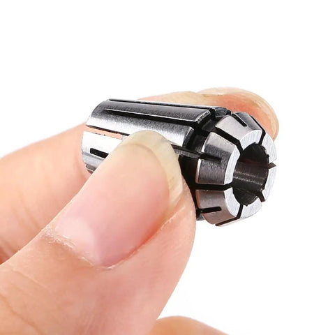 Er11 CNC Collet Set In 4mm 6mm And One Eighth Inch Size Premium 65Mn Spring Steel held between fingers for milling engraving machining