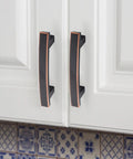 Oil Rubbed Bronze Cabinet Pulls 30 Pack 5 Inch Center To Center Kitchen Cabinet Hardware installed on white cabinets