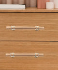 Close-up of Solid Aluminum Alloy Cabinet Drawer Handles 96mm Gold Finish on wooden dresser, showcasing smooth design