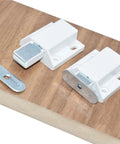 Magnetic Push Latch Cabinet Hardware With Push To Open Touch Lock on wood surface