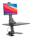 Heavy Duty Electric Standing Desk Converter With Monitor Mount And Wide Keyboard Tray, motorized sit stand riser in black.