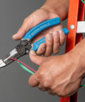 Person using heavy duty wire cutters with lock and built-in wire stripper on red ladder, 8 to 18 AWG solid and 10 to 20 AWG stranded.