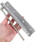 Hand holding Automatic Stainless Steel Door Closer for Home and Office, Smooth Soft Close, Easy Install, Durable Silver Finish