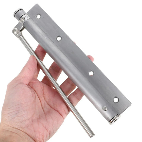Hand holding Automatic Stainless Steel Door Closer for Home and Office, Smooth Soft Close, Easy Install, Durable Silver Finish