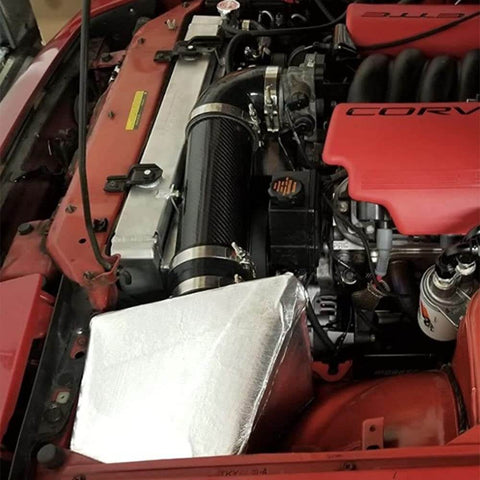 Fiberglass Heat Shield Tape with Aluminum Backing installed in car engine bay for extreme heat protection, 12x48 inch sheet