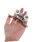Person holding 2 Pack Heavy Duty Stainless Steel Sliding Door Rollers With Silent Nylon Wheels for smooth operation