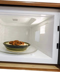 Microwave interior with bowl of food, focus on 10 Piece Mica Insulation Sheets For Microwave Ovens as waveguide cover.