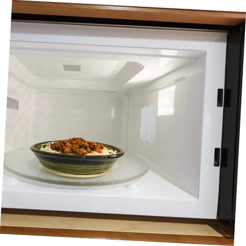 Microwave interior with bowl of food, focus on 10 Piece Mica Insulation Sheets For Microwave Ovens as waveguide cover.