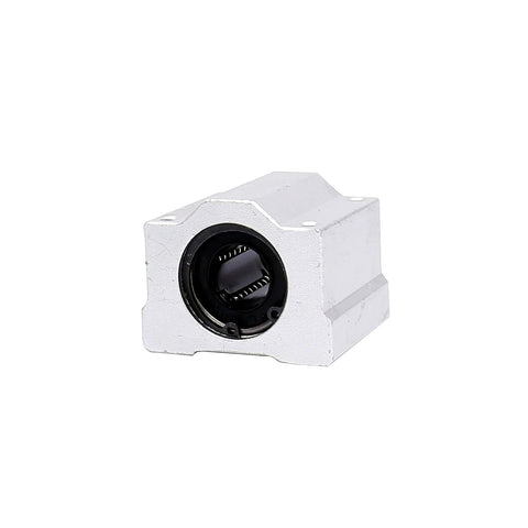 SCS16UU linear motion bearing block, front-angled view, white aluminum housing, 16 mm bore