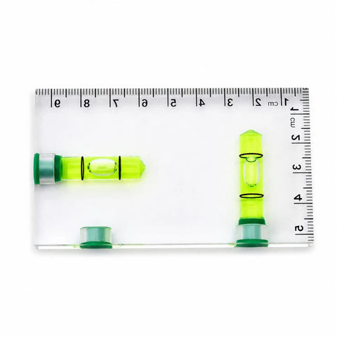 RuiJOTWAT Clear Magnetic Spirit Level Dual Direction Mini Spirit Level Tool For Carpentry Diy Projects on ruler, two vials visible.