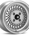 Silver classic mesh wheels 15x7 4x100 with machined lip, perfect for street or track use, enhancing old-school tuning vibe.