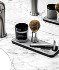 Drying Stone Sink Tray With Non Slip Base For Kitchen And Bathroom, Granite Look, holding a shaving kit on marble counter