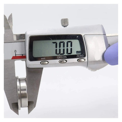 Digital caliper measuring 7.00mm, showcasing precision for Four Pack Heavy Duty SF608ZZ Flanged Ball Bearings.
