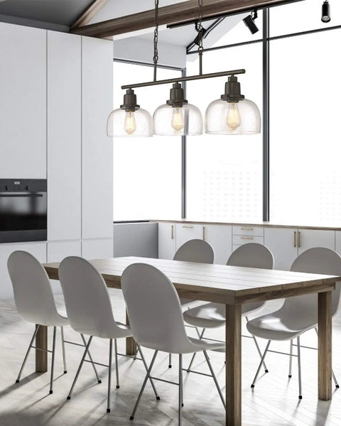 Three Light Farmhouse Kitchen Island Pendant Chandelier, 35.4 in Long, black finish over dining table with white chairs