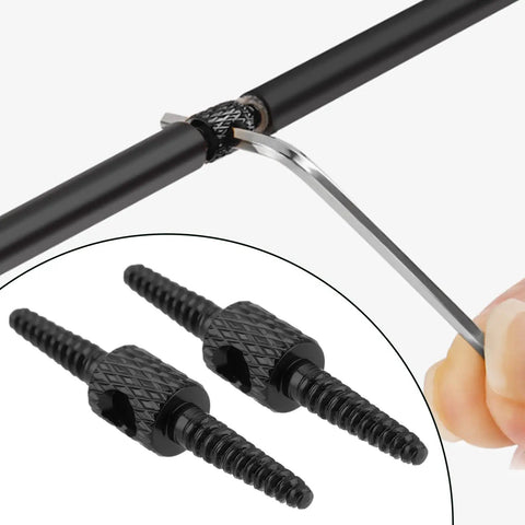 Close-up of black Ten Pack 26mm Bicycle Cable Connectors For Brake And Shift Cables, 2mm Aperture on bike frame.