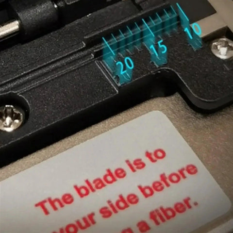 Close-up of GH-850 High Precision Optical Fiber Cutting Knife showing the adjustment scale and safety warning for fiber cutting.