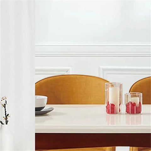 Dining area with modern yellow chairs and table, no visible Beefy Heavy Duty Wall Mounted Shelf Bracket Set For Tables And Corners hardware.