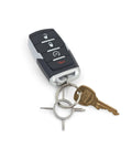 Pocket EDC 4 In 1 Screwdriver For Glasses Sunglasses And Small Electronics With Flat And Phillips Heads Lightweight Hardened Steel Mini Repair Tool On Your Everyday Carry Key Ring next to a car key on a white background