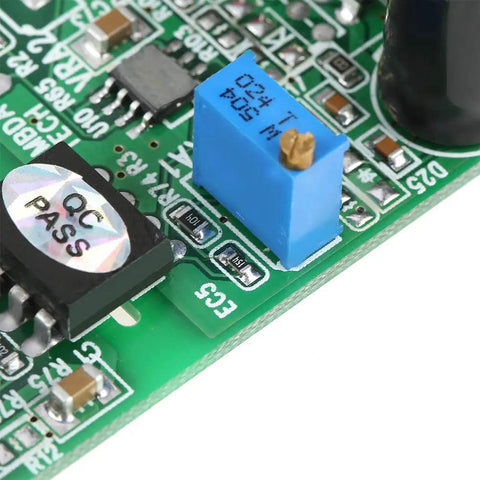 Close-up of 0-10V Signal Isolation Module for PLC and MCU, showing dual DC12-32V power input, onboard components, green circuit board.