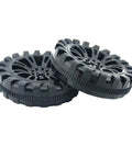 Close-up of black wheels from DIY RC Toy Wheel And Shaft Kit With 100 Black Plastic Wheels And 50 2Mm X 100Mm STEM Shafts For Cars Boats