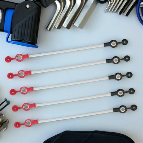 Five Pack Battery Tricycle Charging Cable Connector For EVs, Easy Install, with tools and components on a table