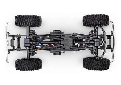 Undercarriage view of Scale And Trail Crawler With 1979 Chevrolet K10 Body In One Eighteen Scale 4x4 Electric Truck chassis and wheels.